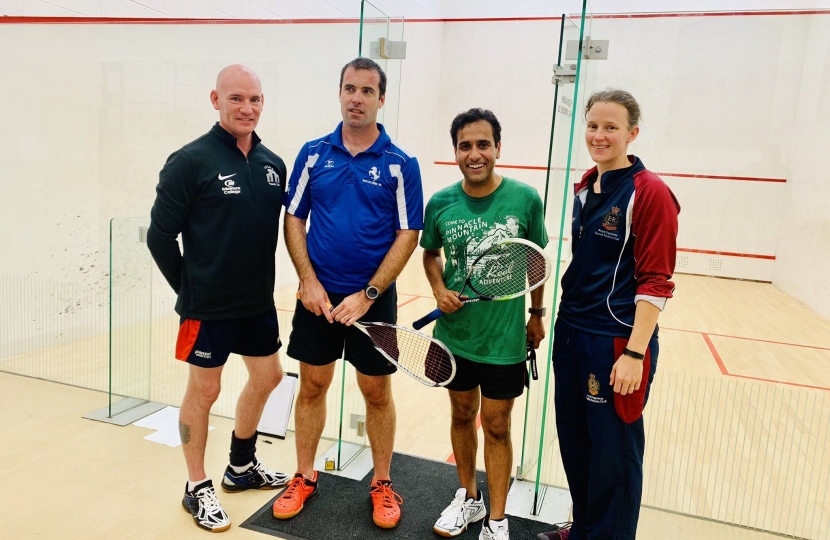 Rehman with other squash players at the competition