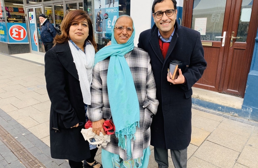 Rehman with local councillor and resident