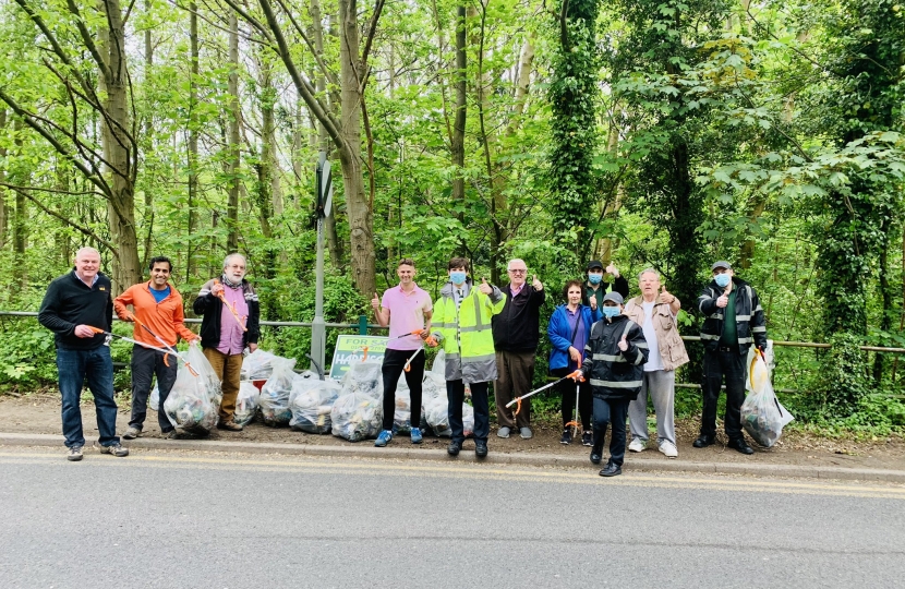 Rehman with local councillors and volunteers at the community litter pick
