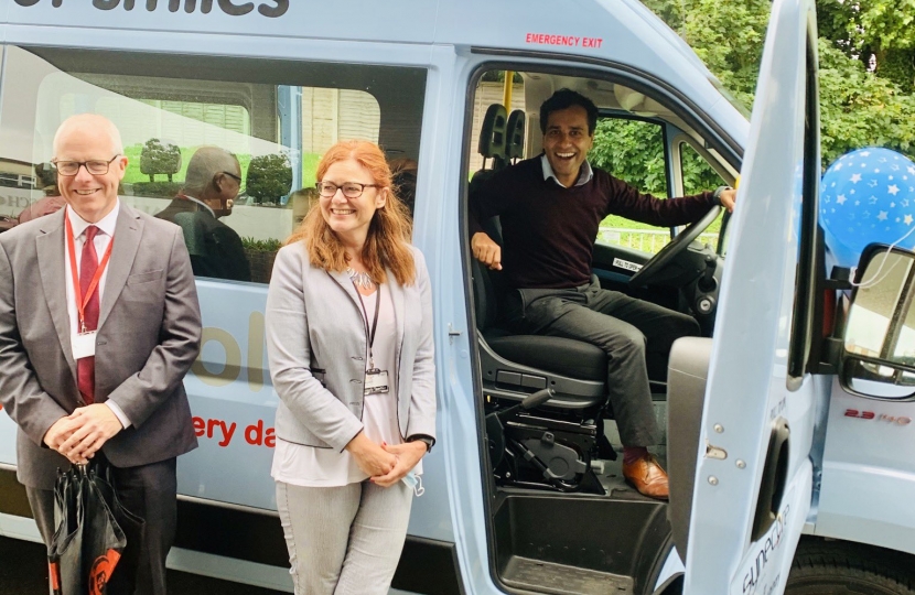 Rehman with the new Tywdall school minibus