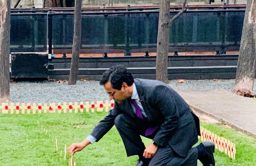 Rehman placing the tribute