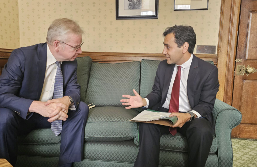 Rehman sitting down with Michael Gove