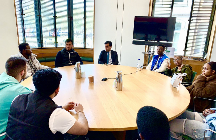 Rehman with students from Mid Kent College in parliament