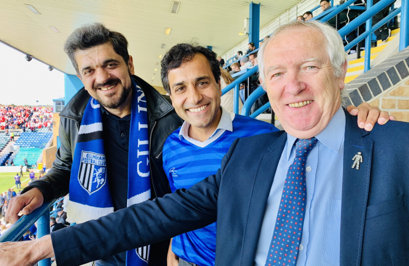 Rehman watches Gillingham FC play against Rotherham with former MP Kevin Barron