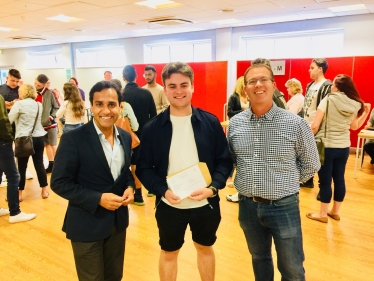 Rehman local A-level student receiving his results