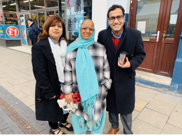 Rehman with local councillor and resident