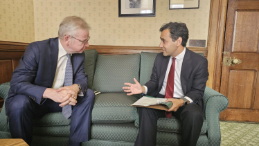Rehman sitting down with Michael Gove